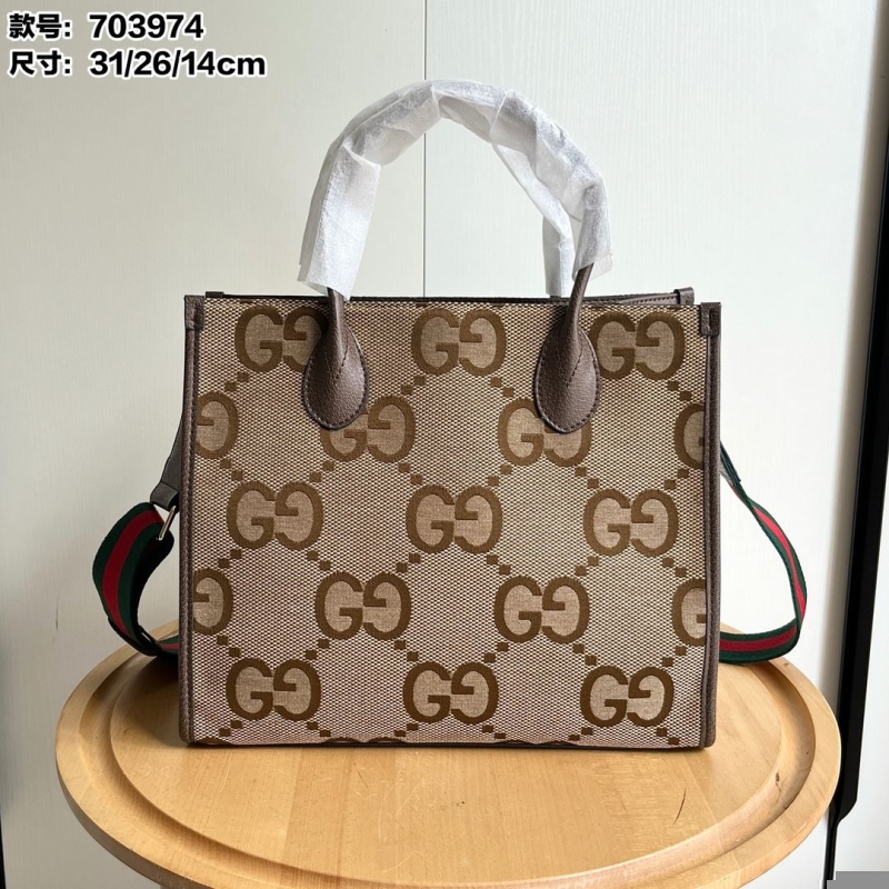 G*u*i shopping bags
